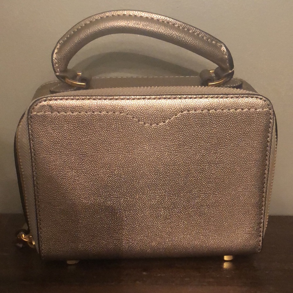 Gold Rebecca Minkoff Bag. Zip closure.